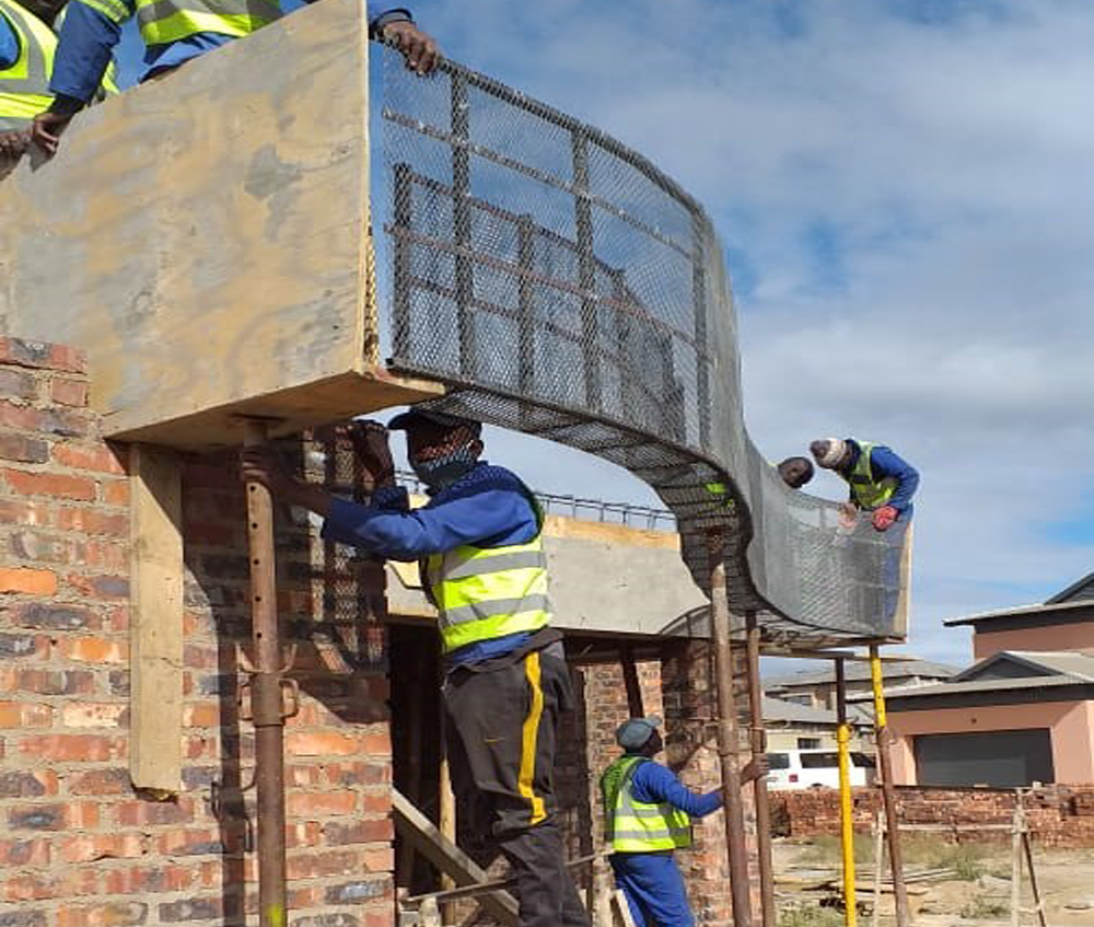 Rib and block walkway being constructed